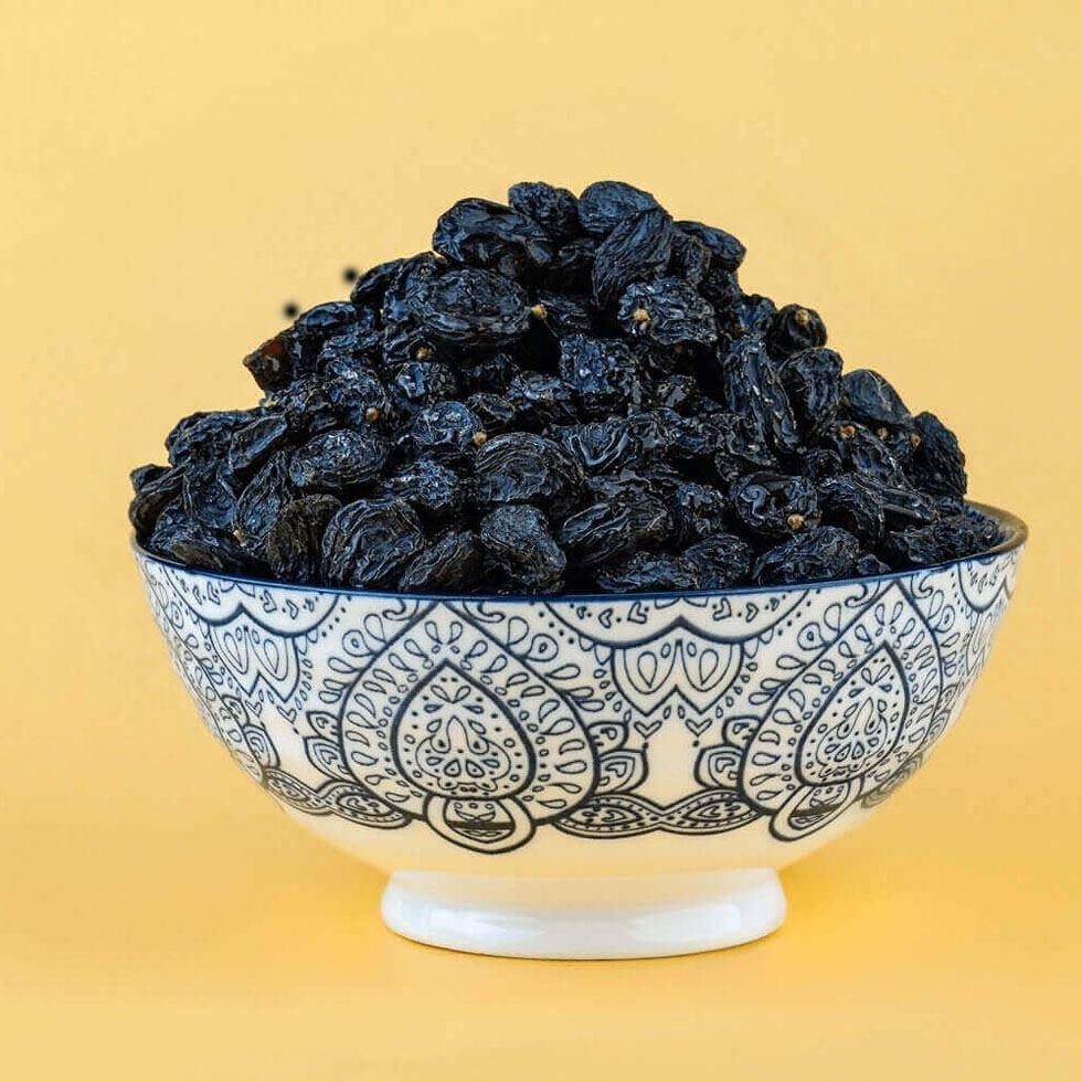 Grown Dried Black Raisins Image