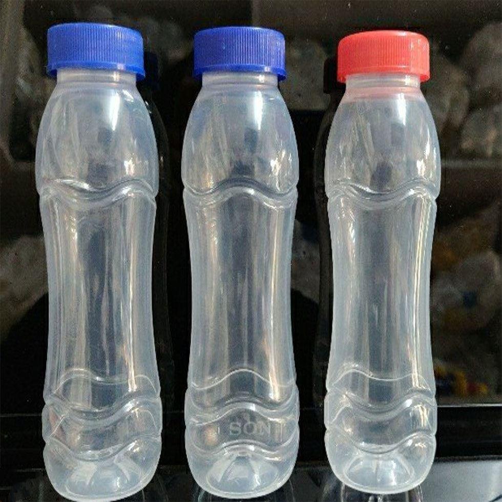 Plastic Milk Bottles Image